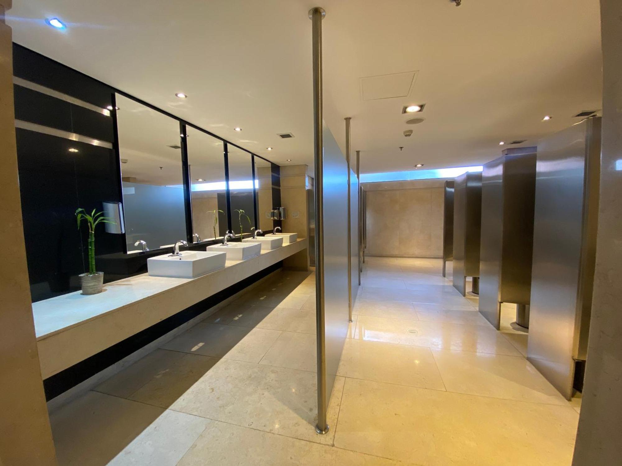 Hilton Doubletree Bogota Salitre Ar Hotel Exterior photo The interior of the public washroom at the airport.